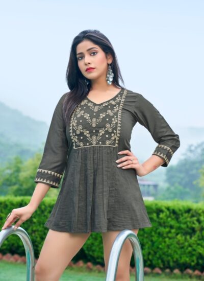 Model posing in a Grey Embroidered Short Kurti showing the gathered peplum hem.